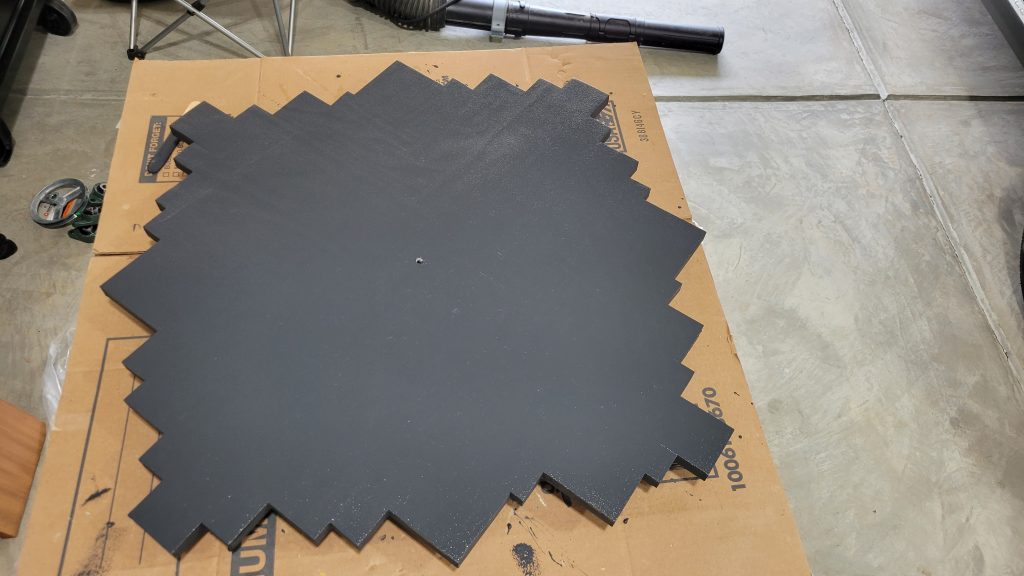 Dark finish applied to the jagged abstract wall clock face