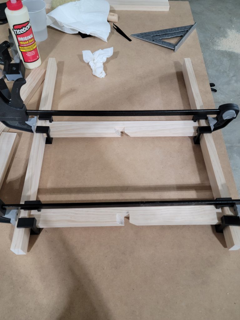 Frame pieces clamped for alignment.