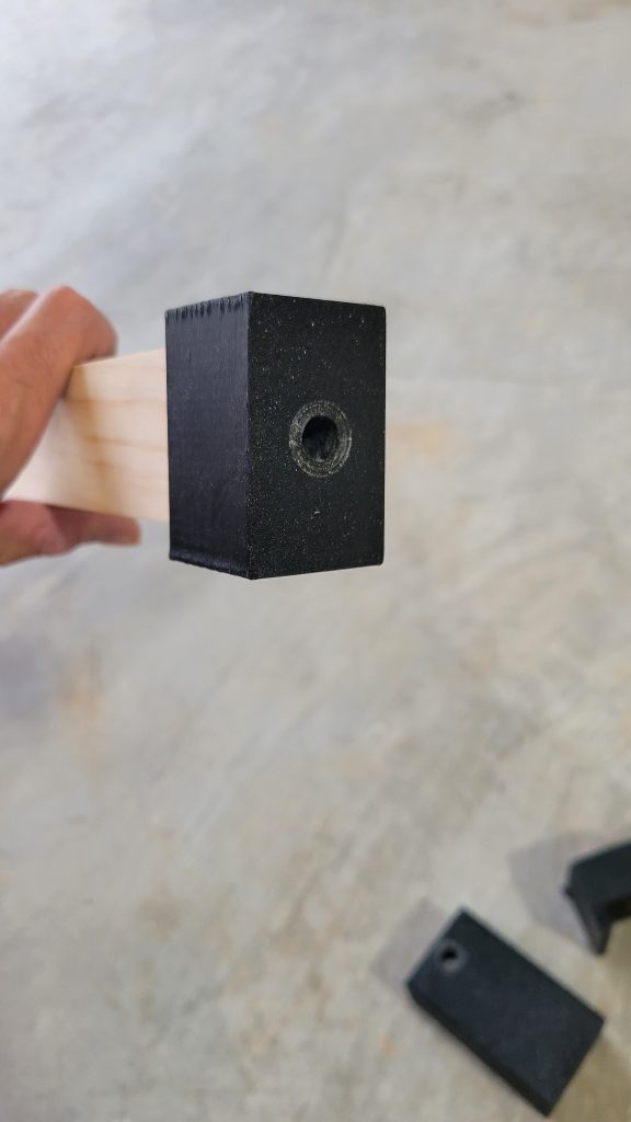 Drilling aid positioned on the workpiece.
