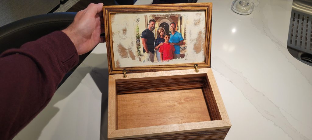 Open Zebrawood gift box showing a Mod Podge photo transfer inside the lid