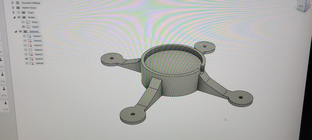 Charger holder modeled for the underside.