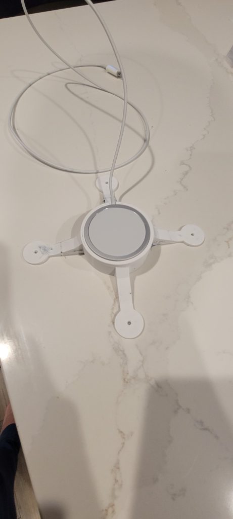 Wireless charger mounted below the top.