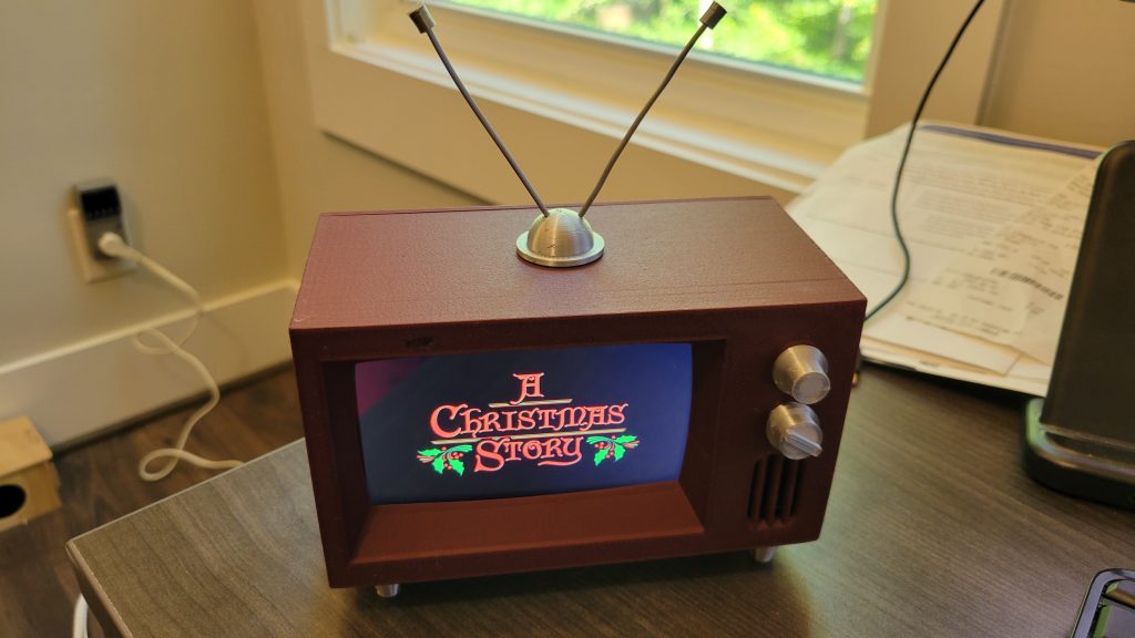 Finished mini retro TV with antenna, screen, USB power cable, speaker grille, and control knobs