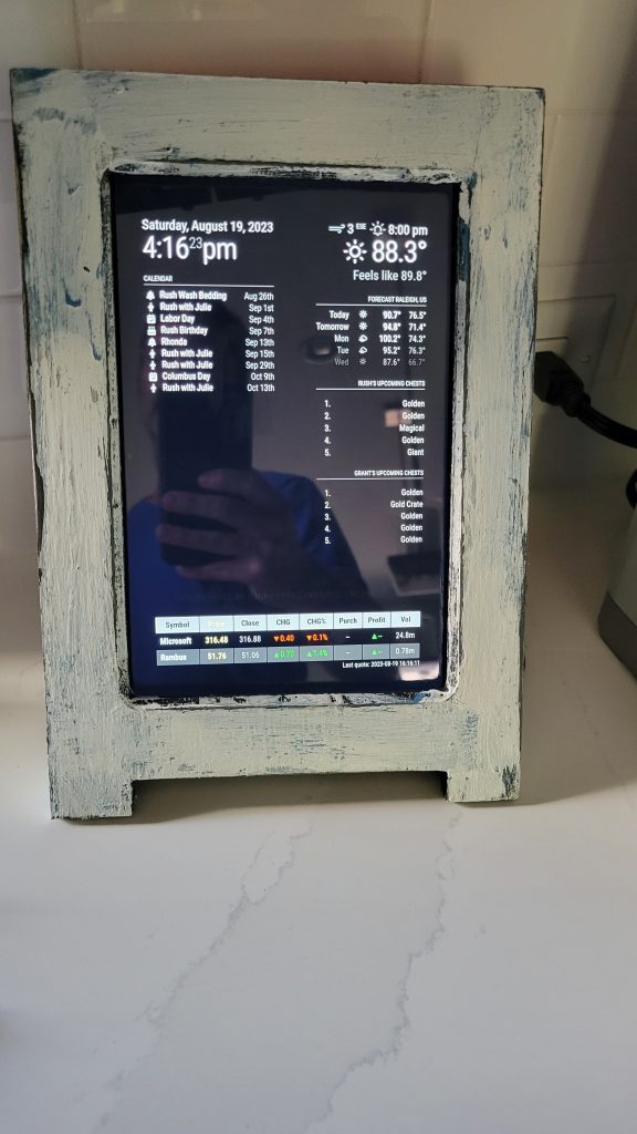 Finished front view of the Magic Mirror daily dashboard with time, weather, calendar, news, and stock sections visible