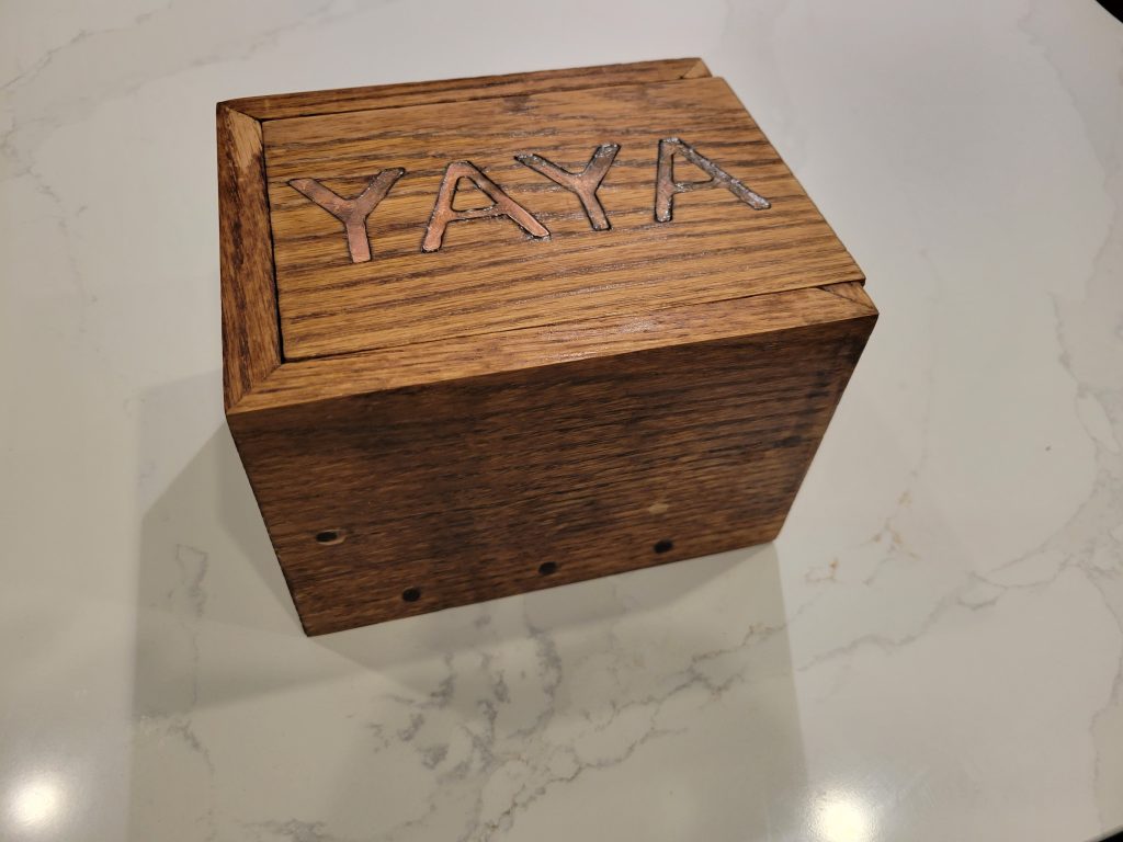 Finished handmade wooden recipe box with a sliding lid and YaYa brass inlay