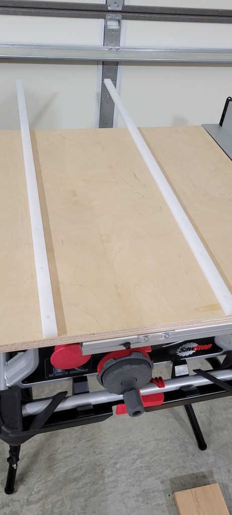 Crosscut sled fence and saw area during setup.