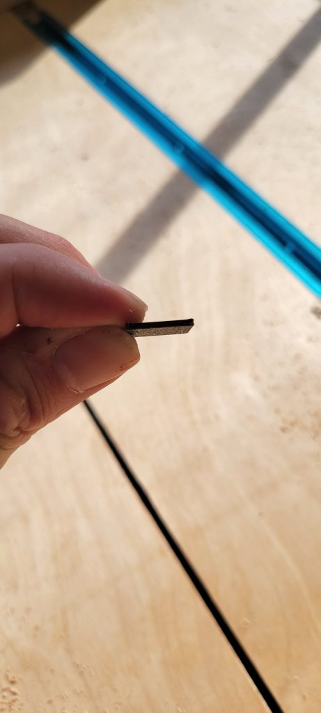Thin offcut used while calibrating the crosscut sled fence.