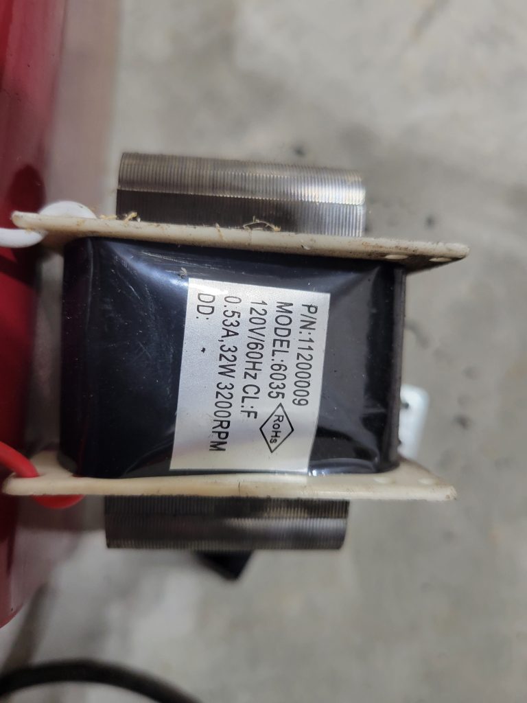 Close-up of the rock tumbler motor area after the failure point.